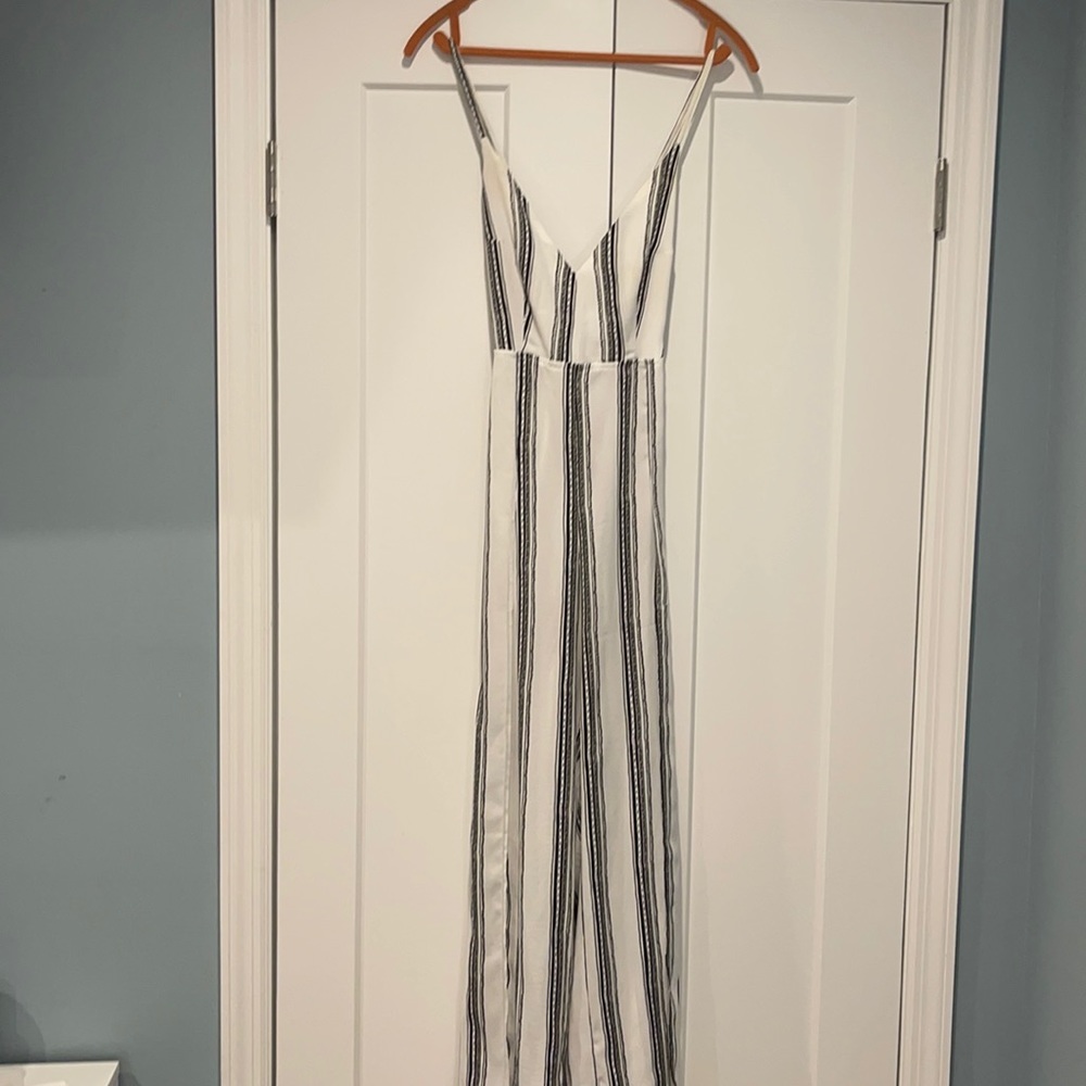 White and black open back slit legs jump suit!!